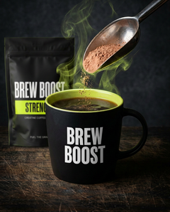 Scoop of Brew Boost going into coffee